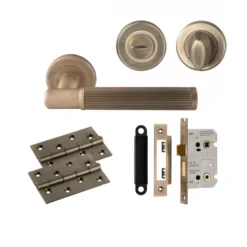 CARLISLE Antique Brass Image Lines Lever Handle Door Kit - Bathroom